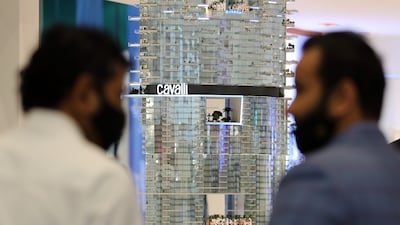 Visitors at the Damac stand on the first day of Cityscape Global.