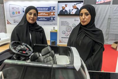 Students from the Higher Colleges of Technology - Women's Campus in Abu Dhabi showcase alert system which detects children left in cars. Antonie Robertson / The National