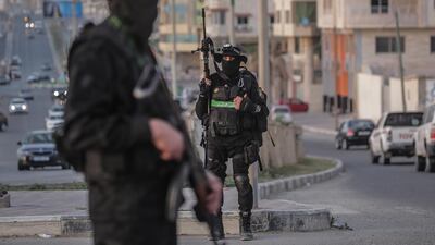 Fighters from the Qassam Brigades, the armed wing of Palestinian Hamas movement patrol to distribute dates and water before the breakfast during the holy month of Ramadan in Gaza City, Gaza Strip, 16 May 2019. EPA