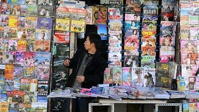Spoilt for choice: China's thriving magazine industry furnishes a plethora of titles and consumers their wallets bulging from rapid economic growth, seem happy to shell out up to 20 yuan each for magazines. Teh Eng Koon / AF