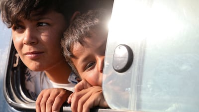 Kurds displaced during Syria's civil war make their way to their hometown of Ras Al Ain earlier this month. Reuters