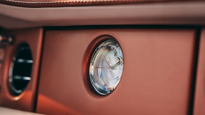 The Boat Tail features a clock with mother-of-pearl accents.