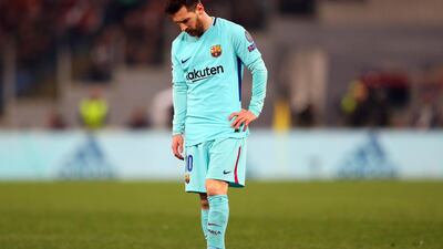 A dejected Lionel Messi of Barcelona after their defeat to Roma in the Uefa Champions League quarter-final second-leg match in Rome. Catherine Ivill / Getty Images
