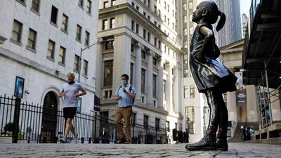 The 4-foot bronze Fearless Girl statue that was installed opposite New York City's Charging Bull in 2017 will remain in its current spot opposite the New York Stock Exchange at least until early 2023. AP