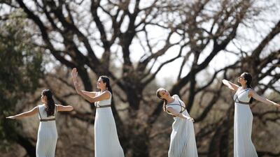 Actresses perform during the Olympic flame lighting ceremony for the Tokyo 2020 Summer Olympics. Reuters