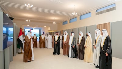 Pictured, from left, Sheikh Ammar bin Humaid Al Nuaimi, Sheikh Sultan bin Mohammed Al Qasimi, Sheikh Saud bin Saqr Al Qasimi, Sheikh Saud bin Rashid Al Mualla, Sheikh Mohammed bin Rashid, Sheikh Mohamed bin Zayed and Sheikh Hamad bin Mohammed Al Sharqi, with Mr Balama. Mohamed Al Hammadi / Ministry of Presidential Affairs