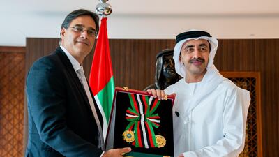 Sheikh Abdullah bin Zayed, Minister of Foreign Affairs and International Co-operation, presents Masud Husain, Canadian ambassador to the UAE, with the Order of Independence First Class. Wam