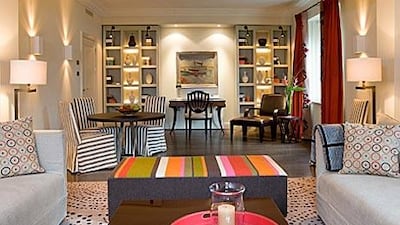 The hotel's Suite Magritte is decorated in neutral colours with splashes of bright colour.