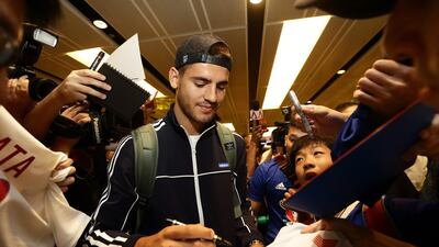 Alvaro Morata of Chelseasigns autograph for fans after he arrives at Changi International Airport ahead of the International Champions Cup on July 22, 2017 in Singapore. Suhaimi Abdullah / Getty Images