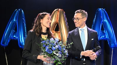 Mr Stubb and wife Suzanne Innes-Stubb celebrate winning the first round of the presidential elections in Helsinki, Finland, on January 28. AP