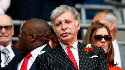(FILES) In this file photo taken on May 27, 2017 Arsenal's US owner Stan Kroenke waits for kick off in the English FA Cup final football match between Arsenal and Chelsea at Wembley stadium in London on May 27, 2017. Arsenal majority shareholder Stan Kroenke on August 7, 2018 announced an offer to buy the entire British football club, valuing it at £1.8 billion ($2.3 billion, 2 billion euros). / AFP PHOTO / Adrian DENNIS / NOT FOR MARKETING OR ADVERTISING USE / RESTRICTED TO EDITORIAL USE