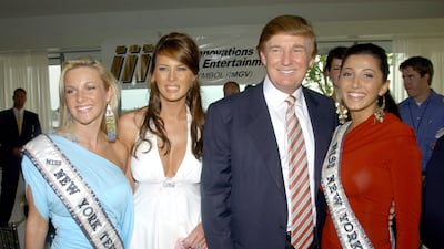 From left, Catherine Muldoon, Miss Teen USA New York, Melania Knauss, Donald Trump and Jaclyn Nesheiwat (Stapp), Miss USA New York, in June 2004. Getty Images