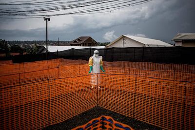 In this file photo taken on November 07, 2018 A health worker waits to handle a new unconfirmed Ebola patient at a newly build MSF (Doctors Without Borders) supported Ebola treatment centre (ETC) on November 7, 2018 in Bunia, Democratic Republic of the Congo. AFP