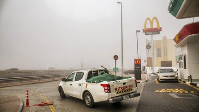 Dubai, December 23, 2017. Foggy ENOC petrol station along Hessa Road. Victor Besa for The National. National