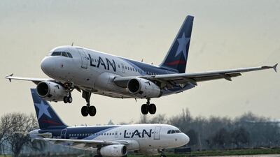 Lan airliners at Santiago airport. The carrier, along with Brazil's Tam, make up Latam Airlines, which has posted forecast-beating profit. Martin Bernetti/ AFP