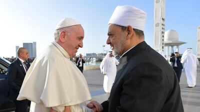 Pope Francis shakes hands with Grand Sheik Ahmed al Tayeb as he arrives for a meeting with members of Muslim Council of Elders at Grand Mosque of Sheik Zayed in Abu Dhabi. EPA/VATICAN MEDIA HANDOUT