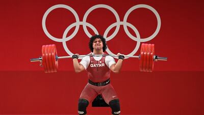 Qatar's Fares Ibrahim Elbakh won gold in the men's 96kg weightlifting.