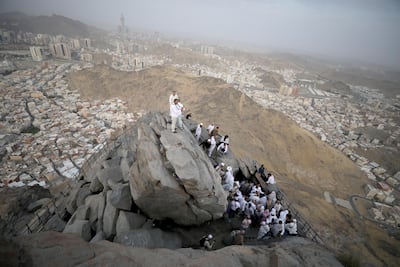 Pilgrims visit Jabal Al Nour, where Cave Hira is located, in Makkah, Saudi Arabia. Getty Images