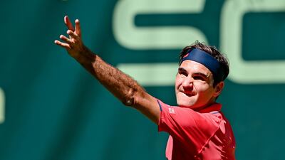 Roger Federer serves to Ilya Ivashka during their Halle Open first round match. Getty Images