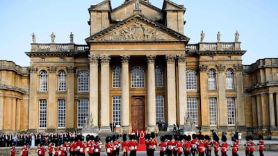 The bands of the Scots, Irish and Welsh Guards perform a ceremonial welcome in the Great Court of Blenheim Palace. AFP
