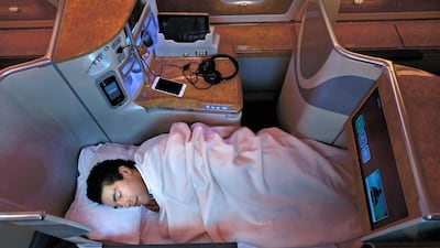 The Emirates A380 800 business class cabin with lie-down bed. Courtesy Emirates