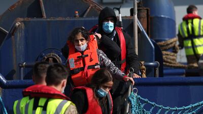 Migrants arrive in Dover, south-east England, after being picked up by UK Border Force. Getty