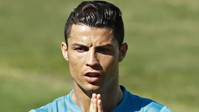 Portugal's Cristiano Ronaldo gestures during a team training session in Campinas. Mauro Horita / Reuters