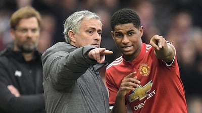 Jose Mourinho gives orders to Marcus Rashford during the Premier League football match between Manchester United and Liverpool on March 10, 2018. AFP