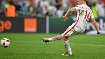 Poland midfielder Jakub Blaszczykowski misses his penalty in the shootout. Peter Powell / EPA