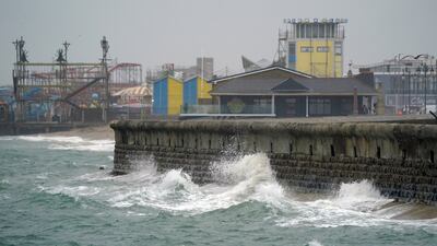 Waves crash in Southsea, Hampshire, as heavy rain and strong winds bring worries of flooding to parts of England and Scotland on October 2. Photo: PA