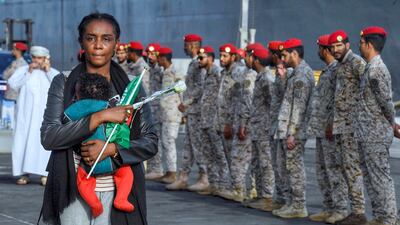 A baby is among evacuees arriving at King Faisal Navy Base in Jeddah. AFP