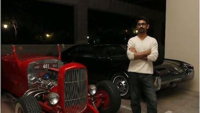 Gaurav Dhar with two of his classic cars. Jeffrey E Biteng / The National