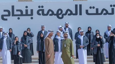 Sheikh Mohammed bin Rashid and Sheikh Mohamed bin Zayed stand for a photo with the UAE Mars Mission team at Bab Al Shams arena in Dubai. Courtesy: Sheikh Hamdan bin Mohammed Twitter