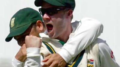 AB de Villiers celebrates after taking a catch to dismiss the England batsman Ian Bell in the second Test at Headingley.