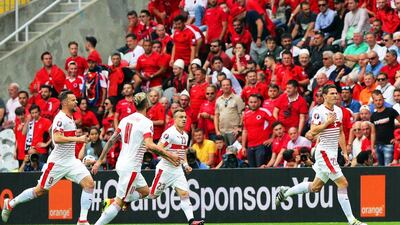 Fabian Schar (R) of Switzerland celebrates with his teammates after scoring the 1-0 lead during the Uefa Euro 2016 group A preliminary round match between Albania and Switzerland at Stade Bollaert-Delelis in Lens Agglomeration, France, 11 June 2016. Mohamed Messara / EPA