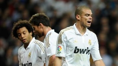 Real Madrid players cut forlorn figures after dropping points in the title race.