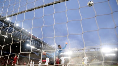 Liverpool's Mohamed Salah scores their first goal. Carl Recine / Reuters
