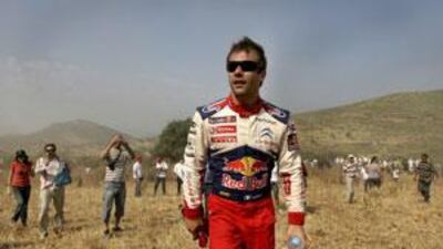 Sebastien Loeb leaves the site where he crashed out during the Klenia Mycenae special stage of the WRC Acropolis rally.