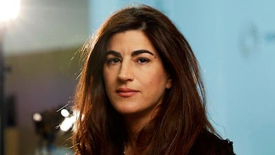 Egyptian director Jehane Noujaim poses for a portrait in Los Angeles, California December 17, 2013. Three years after Egyptian-American filmmaker Noujaim waded into Cairo's Tahrir Square to document the early rumblings of revolution, the army governs Egypt, the Muslim Brotherhood is back underground and protesters are on trial. Picture taken December 17, 2013. REUTERS/Mario Anzuoni (UNITED STATES - Tags: ENTERTAINMENT PROFILE)