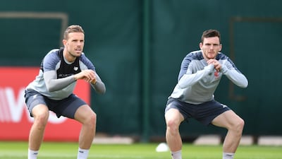 Liverpool's English midfielder Jordan Henderson (left) and Liverpool's Scottish defender Andrew Robertson take part in a training session at Melwood. AFP