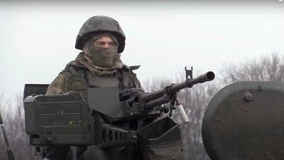 A Russian serviceman guarding a checkpoint in the Luhansk region of Ukraine. EPA