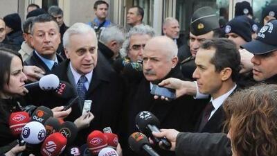 Francis Ricciardone, centre left, and provincial governor Alaaddin Yuksel, centre right, at a press conference outside the US Embassy in Ankara. The Turkish government has denounced comments made by Ricciardone about the prolonged pretrial detention of those accused of plotting against the administration. Adem Altan / AFP