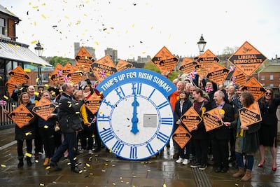 Lib Dem leader Ed Davey celebrates with councillors and supporters after the local elections. Getty