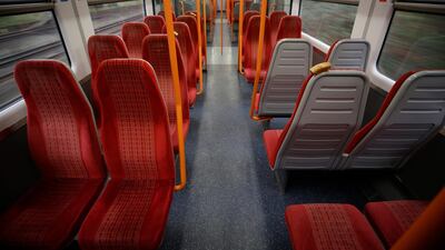 An empty train carriage on a South Western Railway train from Surbiton to Waterloo in London, just before 3pm local time. For most people, the new coronavirus causes only mild or moderate symptoms, such as fever and cough. For some, especially older adults and people with existing health problems, it can cause more severe illness, including pneumonia. AP Photo