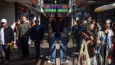 The Campo commercial street in Macau. ADQ secured commitments from more than 30 financial institutions in mainland China, Hong Kong, Macau and Taiwan. AFP