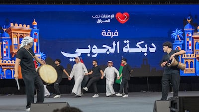 A traditional arts group gives a performance
