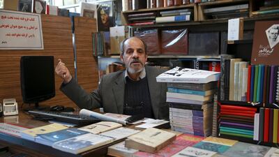 Former revolutionary and bookseller Mohsen Fat'hi talks about Iran's 1979 Islamic Revolution, in downtown Tehran, January 23, 2019. AP