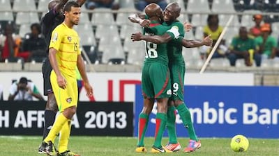 Burkina Faso's Charles Kabore and Moumouni Dagano celebrate their side's win over Togo.