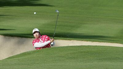 Shanshan Feng tries to battle back in the third round of the Dubai Ladies Masters at the Emirates Golf Club in Dubai. Karim Sahib / AFP