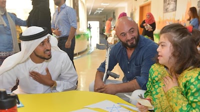 Turkish boxer Fateh Yolonis visited the Rashid Centre for the Disabled. Courtesy Rashid Centre for the Disabled